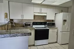 5011 Wiles Rd, Coconut Creek, FL 33073 - Photo 1