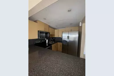 6095 W 19th Ave #407, Hialeah, FL 33012 - Photo 3