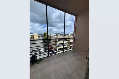 6095 W 19th Ave #407, Hialeah, FL 33012 - Photo 11