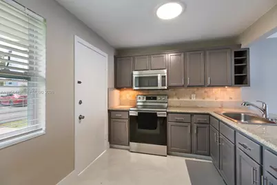 1351 NE 191 St #E 106, Miami, FL 33179 - Photo 11