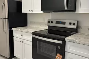 18840 NW 57th Ave, Hialeah, FL 33015 - Photo 1