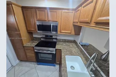 5151 W Oakland Park Blvd #303, Lauderdale Lakes, FL 33313 - Photo 15