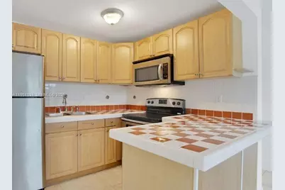4275 NW South Tamiami Canal Dr #2-310, Miami, FL 33126 - Photo 3