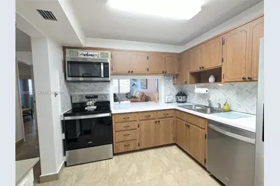 330 SE 2nd St #102E, Hallandale Beach, FL 33009 - Photo 9