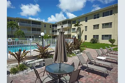 450 Golden Isles Dr #2B, Hallandale Beach, FL 33009 - Photo 13