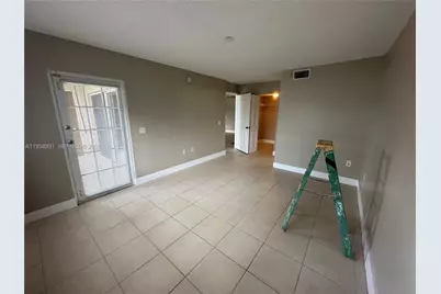 5005 Wiles Rd #104, Coconut Creek, FL 33073 - Photo 3