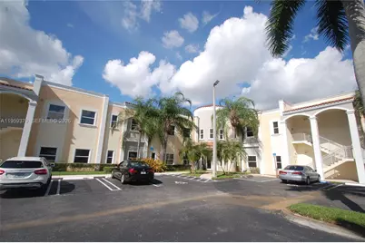 11981 SW 144th Ct #104-105, Miami, FL 33186 - Photo 1