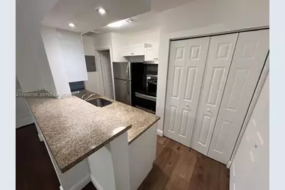 18336 NW 68th Ave #E, Hialeah, FL 33015 - Photo 1