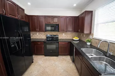 21219 NW 14th Pl #8-25, Miami Gardens, FL 33169 - Photo 1