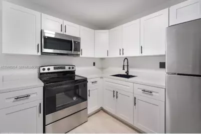 12215 W Dixie Hwy #107, North Miami, FL 33161 - Photo 1