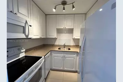 5050 NW 7th St #312, Miami, FL 33126 - Photo 5