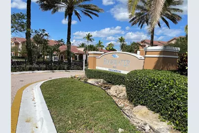 9055 Wiles Rd #103, Coral Springs, FL 33067 - Photo 3