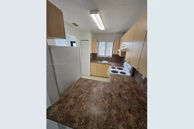 6151 W 24th Ave #207, Hialeah, FL 33016 - Photo 7