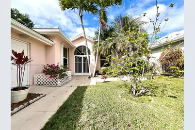 7625 SE Bay Cedar Cir, Hobe Sound, FL 33455 - Photo 1
