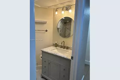 2811 N Oakland Forest Dr #102, Oakland Park, FL 33309 - Photo 13