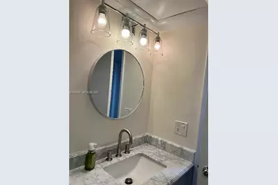 2811 N Oakland Forest Dr #102, Oakland Park, FL 33309 - Photo 15