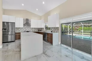 10425 NW 48th Manor, Coral Springs, FL 33076 - Photo 13