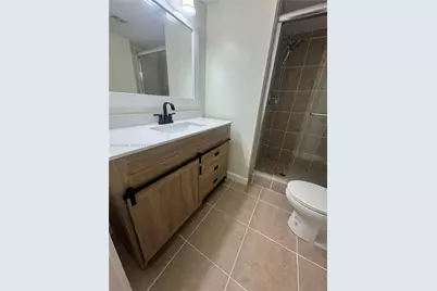 8460 Sunrise Lakes Blvd #111, Sunrise, FL 33322 - Photo 1