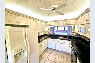 10722 W Clairmont Cir #102, Tamarac, FL 33321 - Photo 11