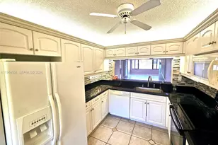 10722 W Clairmont Cir, Tamarac, FL 33321 - Photo 11