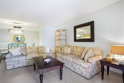 927 NE 199th St #104, Miami, FL 33179 - Photo 1