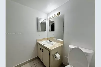 296 Racquet Club Rd #104, Weston, FL 33326 - Photo 11