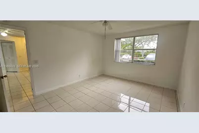 9001 Wiles Rd #103-3, Coral Springs, FL 33067 - Photo 23