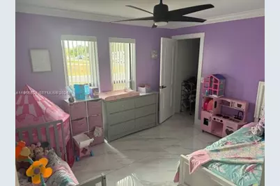 702 NW Orchid St, Port Saint Lucie, FL 34983 - Photo 9