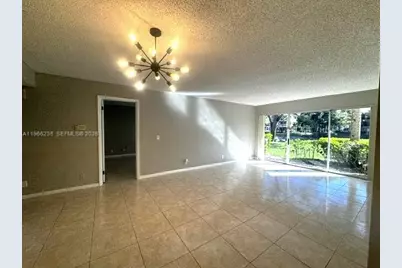 8761 Wiles Rd #102, Coral Springs, FL 33067 - Photo 5