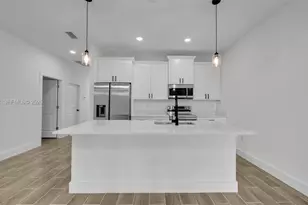 704 Homer Ave, Lehigh Acres, FL 33973 - Photo 9