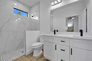 704 Homer Ave, Lehigh Acres, FL 33973 - Photo 17