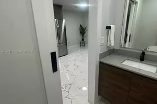 1074 NW 61st St, Miami, FL 33127 - Photo 7