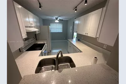 23442 Lyons Rd #404, Boca Raton, FL 33428 - Photo 9