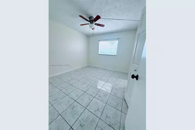 8000 Lagos De Campo Blvd #A-105, Tamarac, FL 33321 - Photo 11