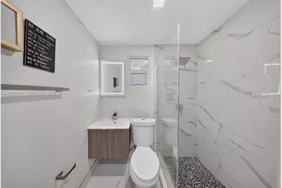 231 NW 44th St, Miami, FL 33127 - Photo 27