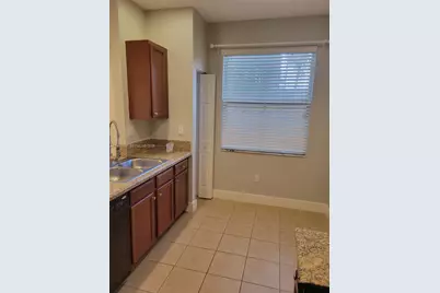 2851 W Prospect Rd #405, Tamarac, FL 33309 - Photo 7