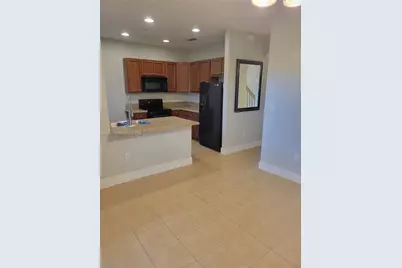 2851 W Prospect Rd #405, Tamarac, FL 33309 - Photo 9