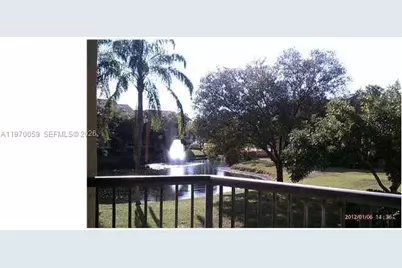 9001 Wiles Rd #204, Coral Springs, FL 33067 - Photo 3
