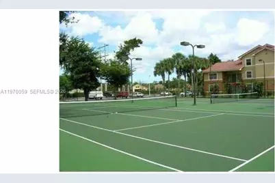 9001 Wiles Rd #204, Coral Springs, FL 33067 - Photo 5