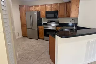 9001 Wiles Rd, Coral Springs, FL 33067 - Photo 9