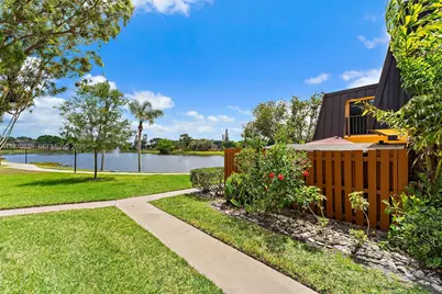 5830 SE Windsong Ln #206, Stuart, FL 34997 - Photo 1