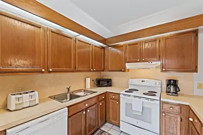 5830 SE Windsong Ln #206, Stuart, FL 34997 - Photo 13