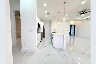 904 Asher St E, Lehigh Acres, FL 33974 - Photo 9