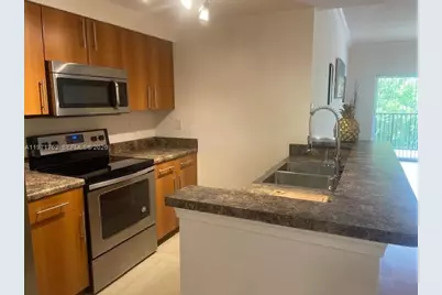 5960 W Sample Rd #305, Coral Springs, FL 33067 - Photo 7