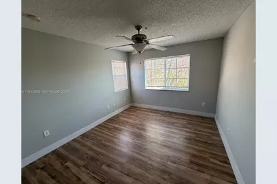 7930 N Nob Hill Rd #304, Tamarac, FL 33321 - Photo 11