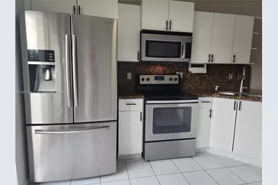 8360 NW 103rd St #204E, Hialeah Gardens, FL 33016 - Photo 11