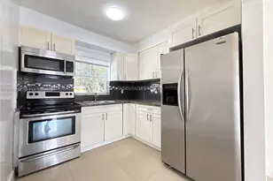 911 NW 57th St, Miami, FL 33127 - Photo 7