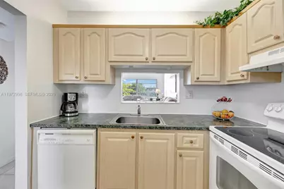 5002 NW 35th St #306, Lauderdale Lakes, FL 33319 - Photo 11