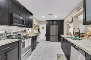 9417 NW 72nd St, Tamarac, FL 33321 - Photo 7