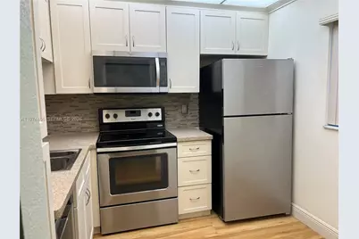 9311 Orange Grove Dr #110, Davie, FL 33324 - Photo 1